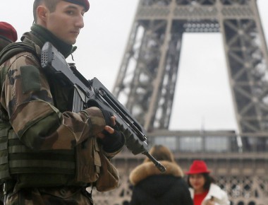 French soldier patrol near the Eiffel Tower in Paris as part of the highest level of "Vigipirate" security