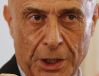 Italian Interior Minister Marco Minniti attends a news conference in Rome, Italy, to announce that the suspect in the Berlin truck attack was killed in a shoot-out in a suburb of the norhtern Italian city of Milan, December 23, 2016.    REUTERS/Alessandro Bianchi