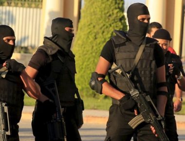 Egyptian special forces police take their positions in front of the main gate at the Borg El Arab “Army Stadium” before the Egyptian Premier League derby soccer match between Al-Ahly and El Zamalek in the Mediterranean city of Alexandria, Egypt, July 21, 2015. The match was played without spectators due to security reasons. Picture taken July 21, 2015. REUTERS / Amr Abdallah Dalsh – RTX1LIWY