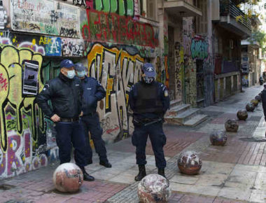 December 6, 2020, Athens, Greece: Police forces secure the memorial of Alexis Grigoropoulos in Exarchia square to prevent people from leaving flowers or protesting.The government prohibited the annual commemoration of Alexis Grigoropoulos, the then 15 year old student who was gunned down by a police officer in Exarchia, central Athens on December 6th, 2008. (Credit Image: © Nikolas Georgiou/ZUMA Wire)
