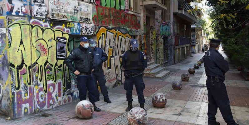 December 6, 2020, Athens, Greece: Police forces secure the memorial of Alexis Grigoropoulos in Exarchia square to prevent people from leaving flowers or protesting.The government prohibited the annual commemoration of Alexis Grigoropoulos, the then 15 year old student who was gunned down by a police officer in Exarchia, central Athens on December 6th, 2008. (Credit Image: © Nikolas Georgiou/ZUMA Wire)